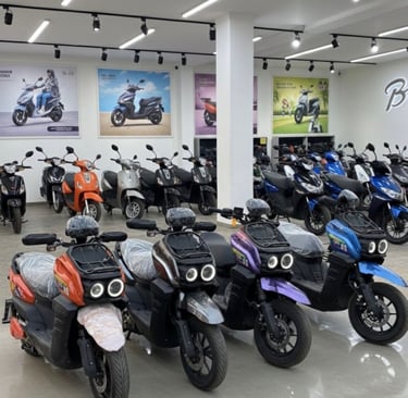 four different colors bikes inside the store