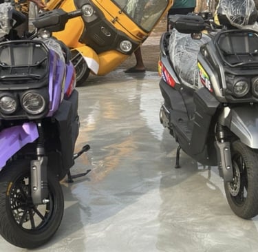 purple and grey and black bikes on a gray cement