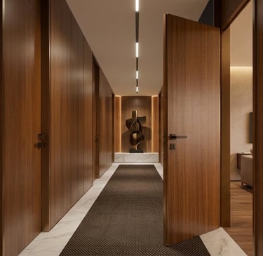 modern-walnut-lacquered-interior-door-with-wall-panel-luxury-hallway