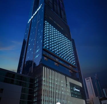 a tall building with a large glass window