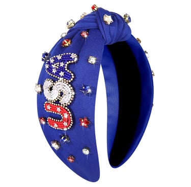 Blue knotted headband with USA beaded lettering and sparkling star jewels for 4th of July.