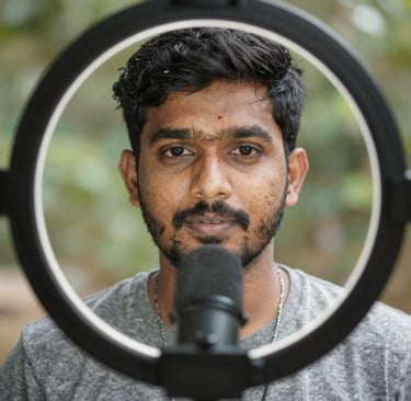 Portrait of a smiling man in a cozy studio setting with warm lighting