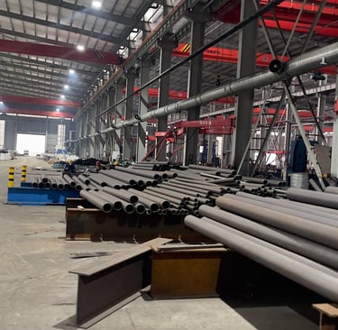 vortixum factory steel pipes being rolled out