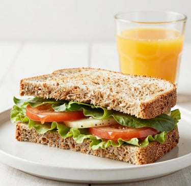 Close-up of a colorful, fresh salad with avocado and cherry tomatoes.