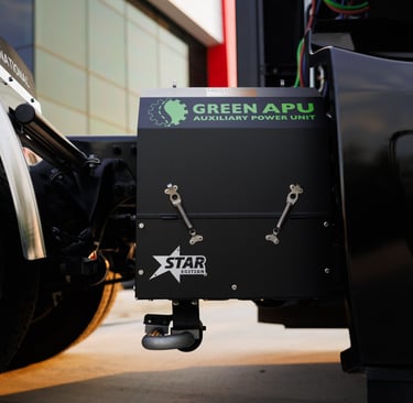 A Green APU auxiliary power unit Star Edition installed on a semi-truck chassis for idle reduction.