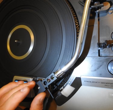 Testing a turntable after repair.