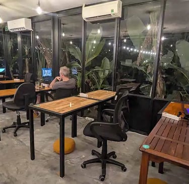 Coworking space with digital nomads working at night in Hoi An, Vietnam