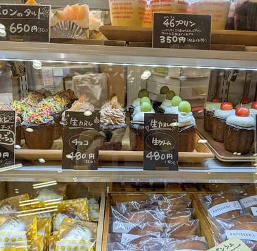 Colorful Japanese pastries displayed in a local bakery.