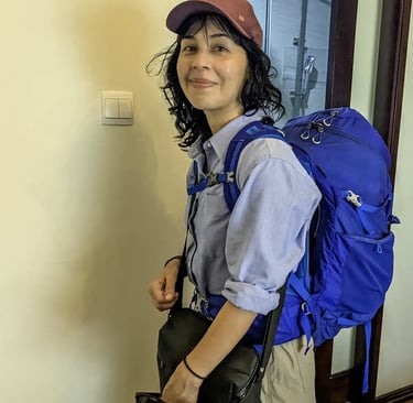 Person wearing backpack before leaving Hoi An, Vietnam