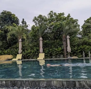 Swimming in the pool to escape the summer heat at a retreat center in northern Vietnam