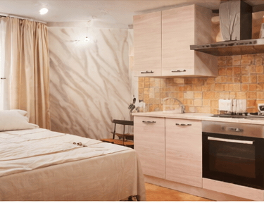 Monolocale con angolo cottura attrezzato e zona giorno