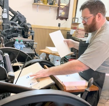 Wade running press in print shop