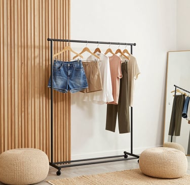 A vibrant display of colorful clothing and stylish accessories neatly arranged on wooden shelves in a cozy boutique setting.