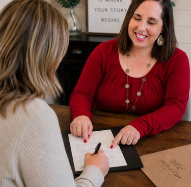 Seller reviewing an offer and inspection terms with a real estate broker