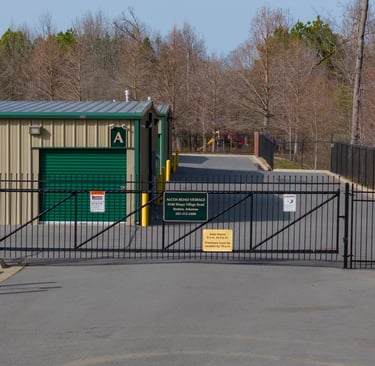 Entrance to Alcoa Road Storage Too at corner of Alcoa Road and Sleepy Village Road