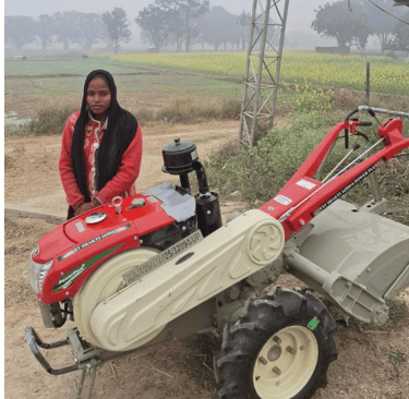 CUSTOMER STANDING WITH THEIR VST 165 DI POWER TILLER