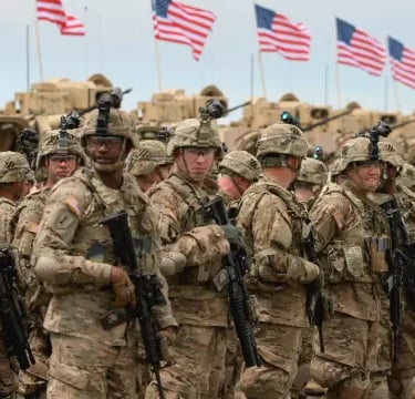 a group of soldiers are standing in formation of a line of soldiers