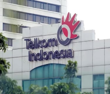 a building with a large sign that says telkom indonesia