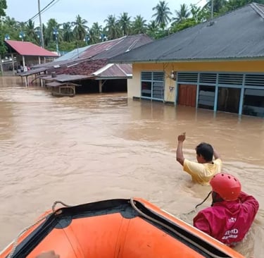 a man in a boat in the water