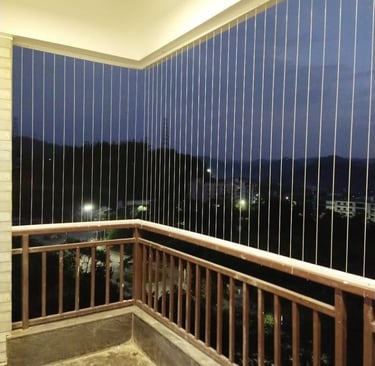 Close-up of sleek invisible grills seamlessly blending with a Kodambakkam balcony