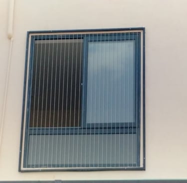 Side angle showing the fine mesh of invisible grills installed by Arjilli Enterprises, t nagar