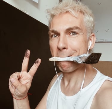 man holding brush in his mouth