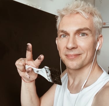 man holding brush in his mouth