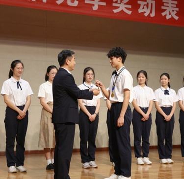a statue of a peacock in front of a building
