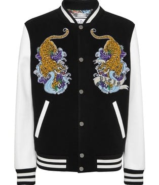 a black and white jacket with a tiger on it
