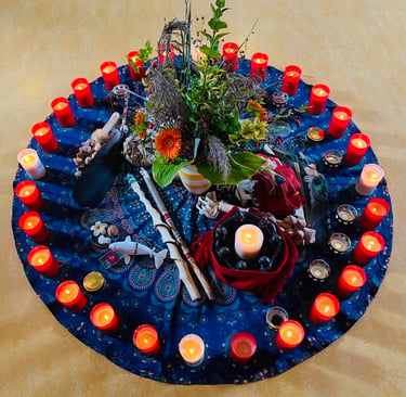 An Altar with a candle and Flowers
