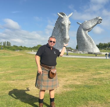 Lesley from Tour Guide Scotland at the Kelpies