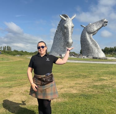 Lesley from Tour Guide Scotland at the Kelpies