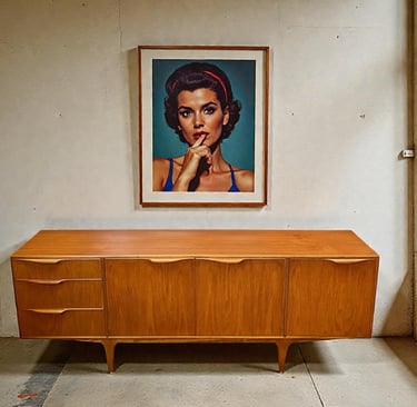 Beautiful vintage 1960s Mid Century Modern McIntosh teak sideboard with clean lines, warm wood grain and sleek Danish design