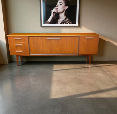 Scandinavian Danish design sideboard with clean lines, showcasing timeless Mid-Century Modern craftsmanship.