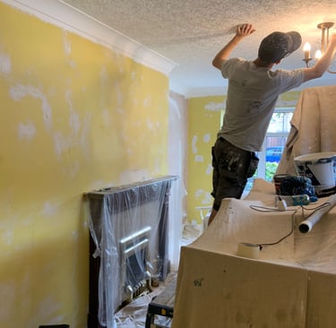 Our staff decorating an interior room in a residential home.