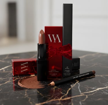 Nude matte lipstick and matching lip liner pencil displayed with red holiday gift packaging on a marble surface.