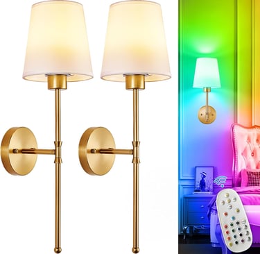 Set of two gold wall sconces with white fabric shades and color-changing RGB LED bulbs for bedroom lighting.