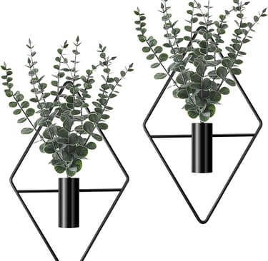 Set of two modern black geometric wall planters featuring artificial eucalyptus greenery for home decor.