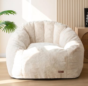 Oversized faux fur cozy reading chair in a neutral beige living room