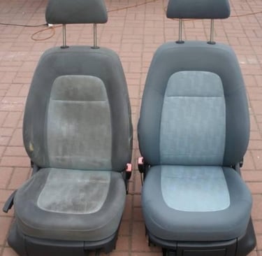 two seats of a car with a seat and a seat