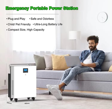 Man sitting on a sofa using a laptop powered by a Helionox 5kW 5kWh portable power station