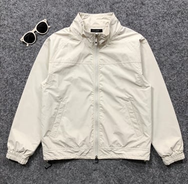 A casual outfit featuring a crew & co shirt and hat, styled for a relaxed weekend outing.