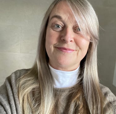 Head and should shot of Dr Siobhan Henley smiling