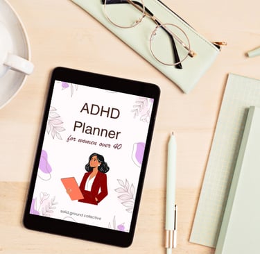 a tablet with a digital planner and a cup of coffee