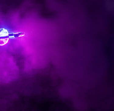 Glowing purple arrow hitting the bullseye of a target in a misty, neon-lit archery setting.