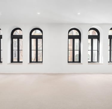 Open event space with arched windows at Thirty-Five Off Madison luxury event venue NYC