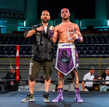 Miguel Bachi pugile con il coach Yari Flammia