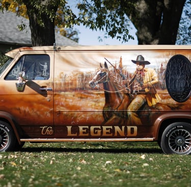 a van with a man on it's side of the van