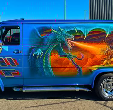 a van with a dragon on it's side