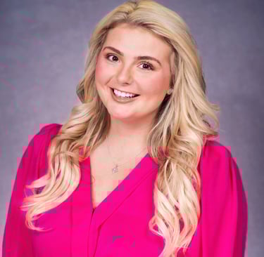 Ashley-Shae Benton, content strategist for small businesses, wearing pink top headshot